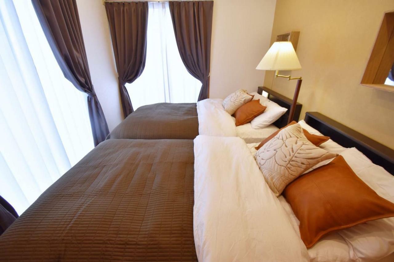 Guest House Tsukishiro Nanjo Ngoại thất bức ảnh