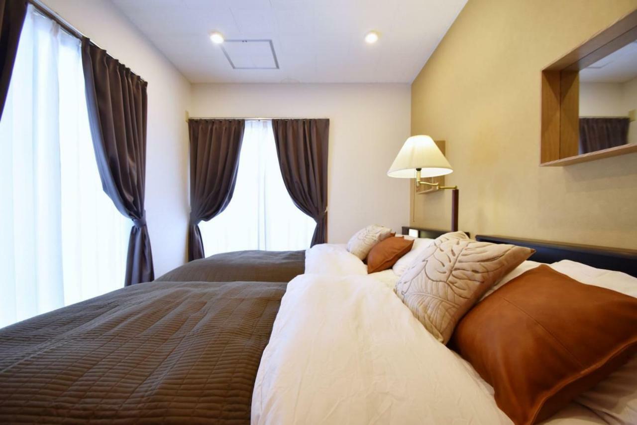 Guest House Tsukishiro Nanjo Ngoại thất bức ảnh